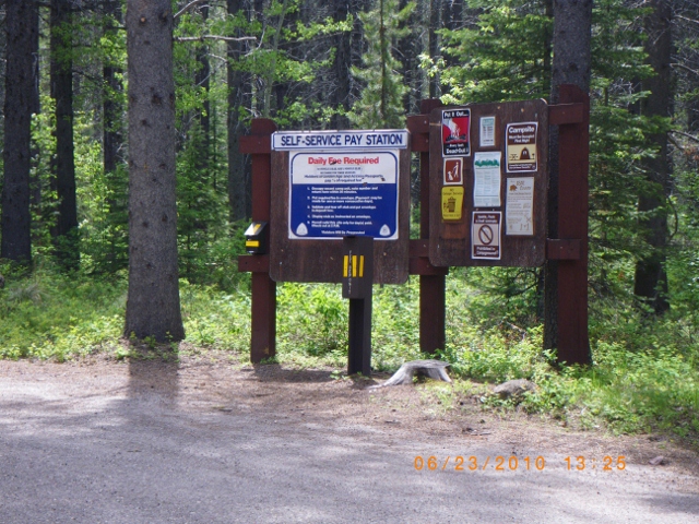 picture showing Information boards and fee station.